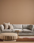 Sabrina Curved Sofa on leather plinth