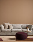 Sabrina Curved Sofa on leather plinth