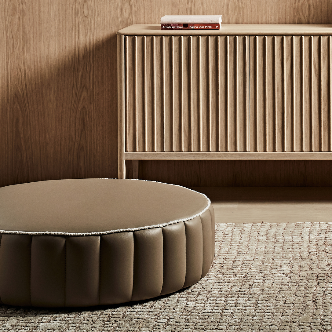 Cloud Scalloped Ottoman in Macadamia Faux Leather with Bubble Dune piping