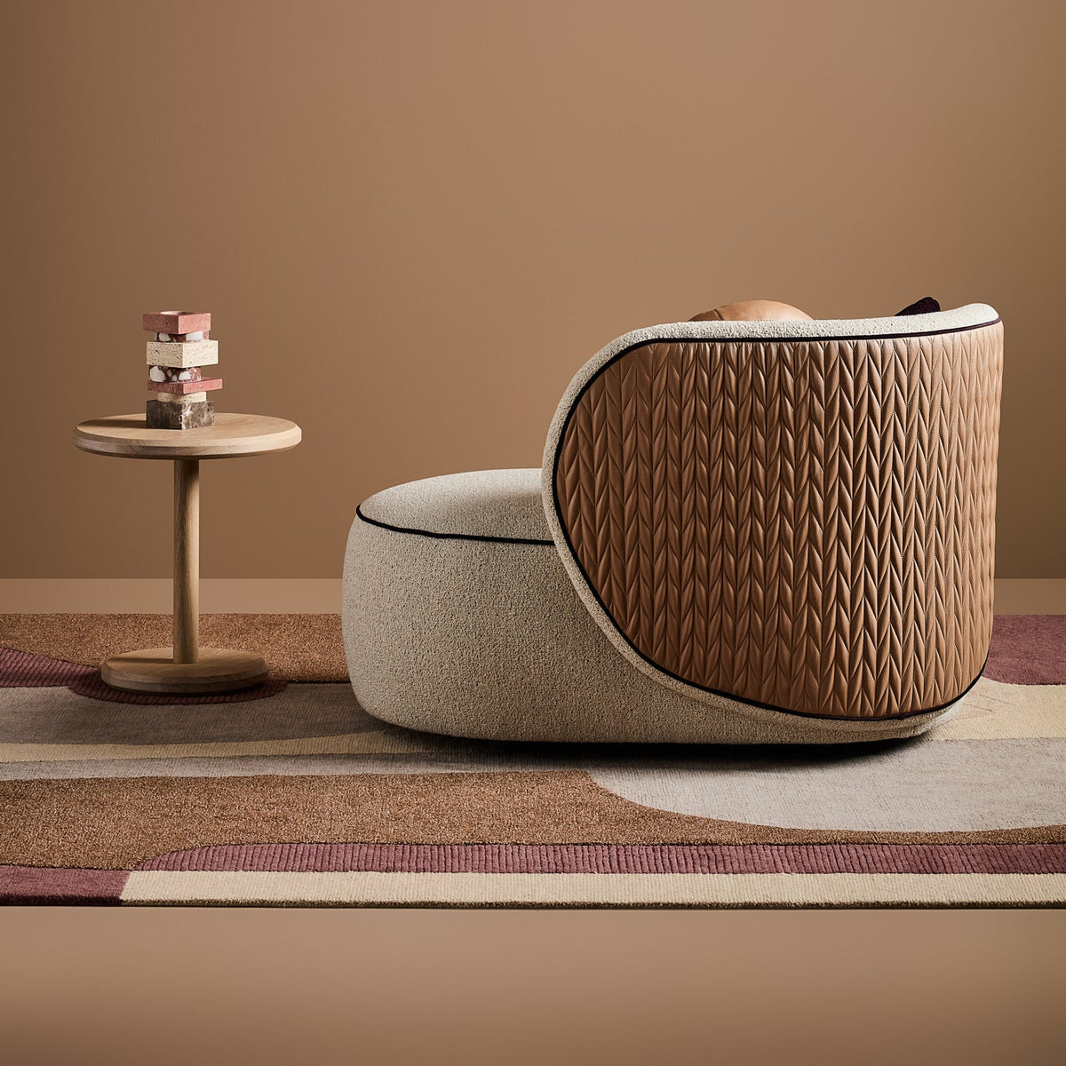 Rosette Chaise Armchair in Sunkissed Weave Malt with Eggplant Velvet piping and Ribbon Stitch Walnut Faux Leather back