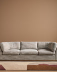 Sabrina Curved Sofa on leather plinth