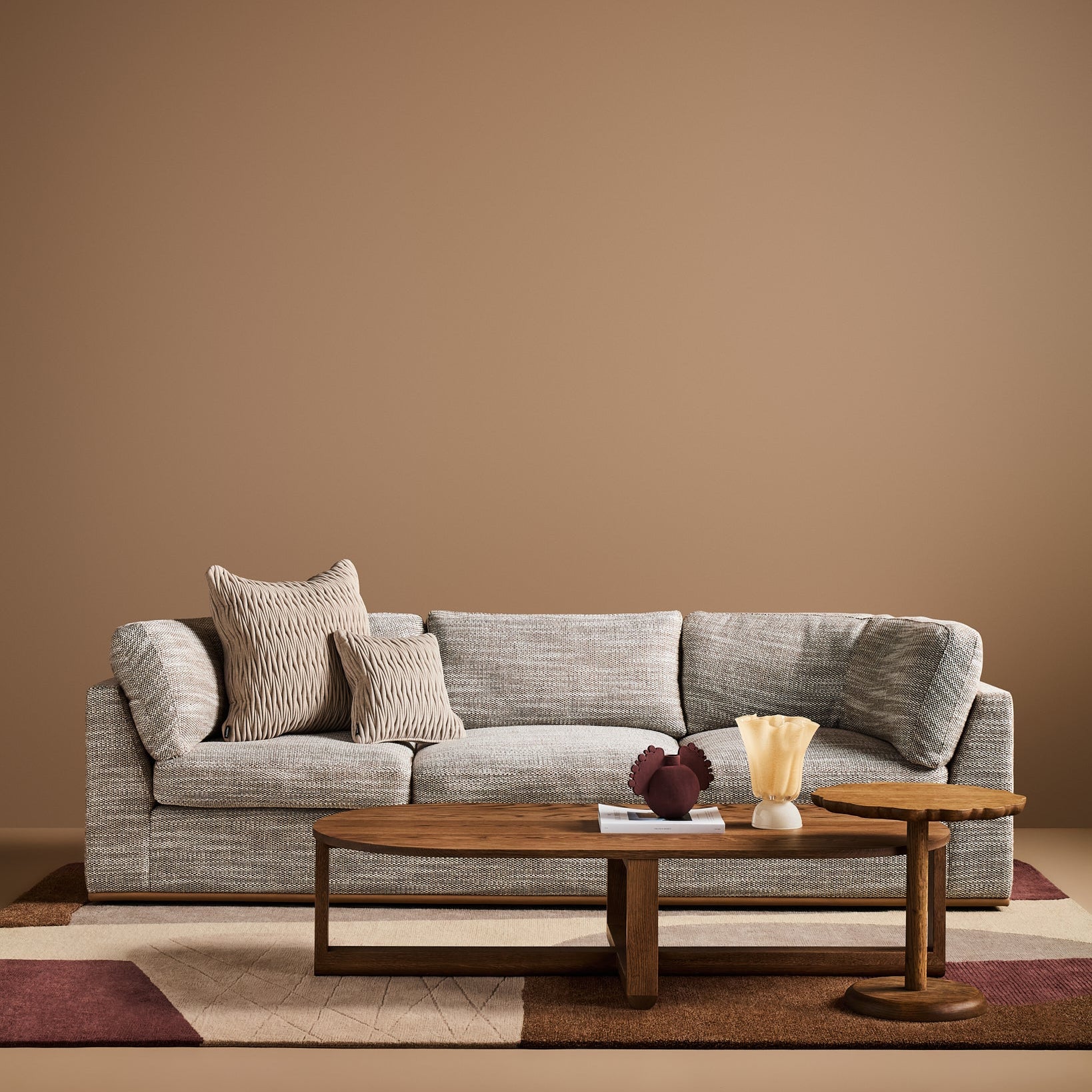 Sabrina Curved Sofa on leather plinth