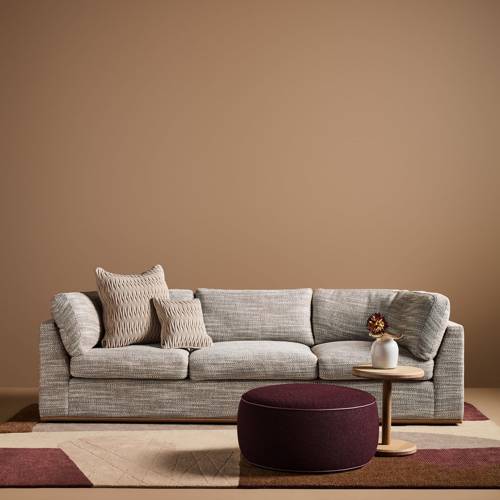 Sabrina Curved Sofa on leather plinth